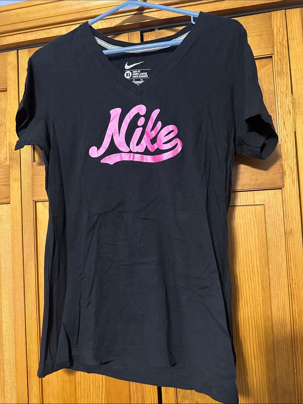 Nike Women’s Black V-Neck Tee with Pink Script Logo